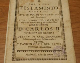 Testamento de Carlos II: En él se designaba Felipe d’Anjou como heredero de la corona.